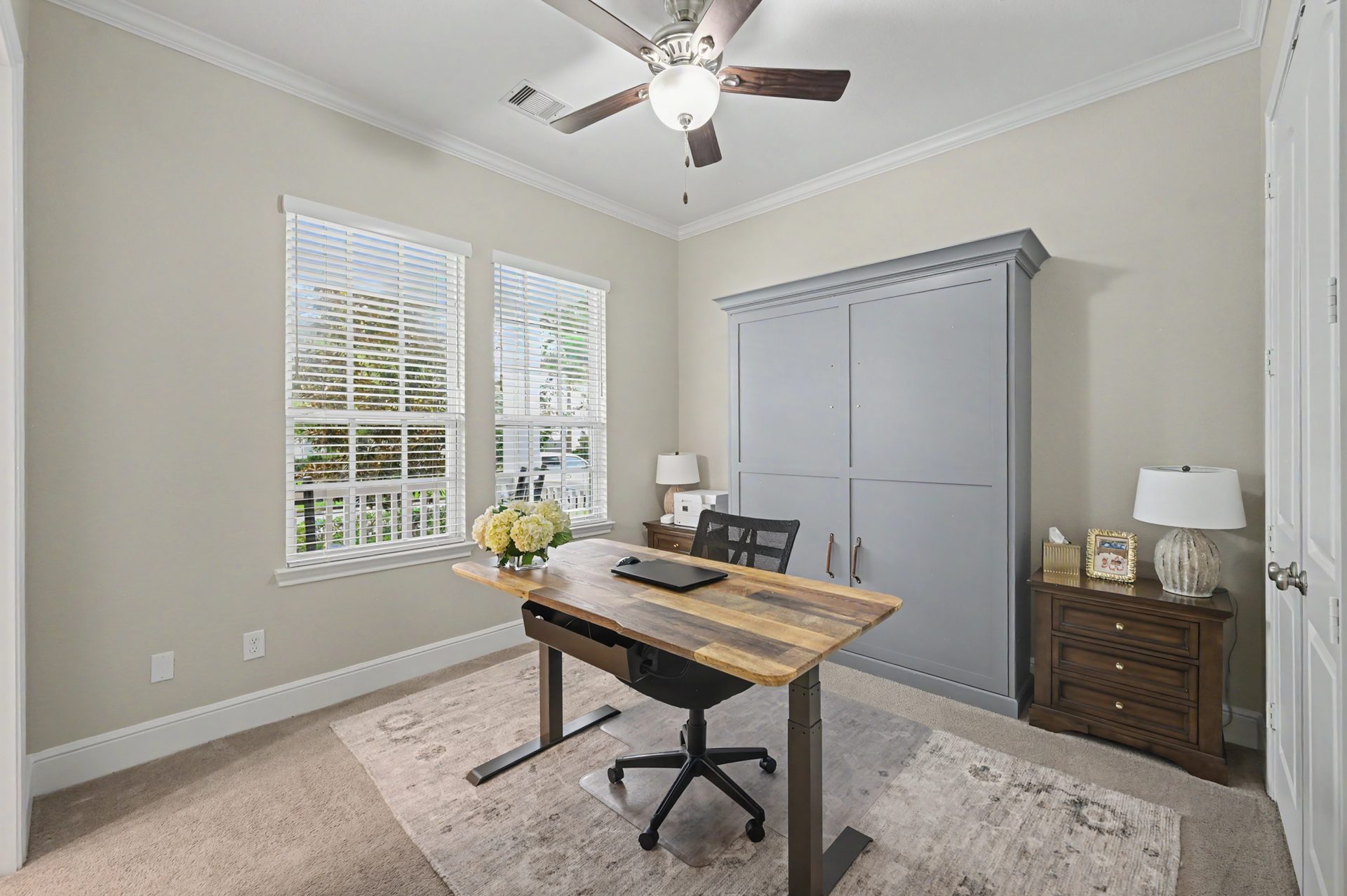 Private home office also used as guest suite with Murphy bed, closet and full bath